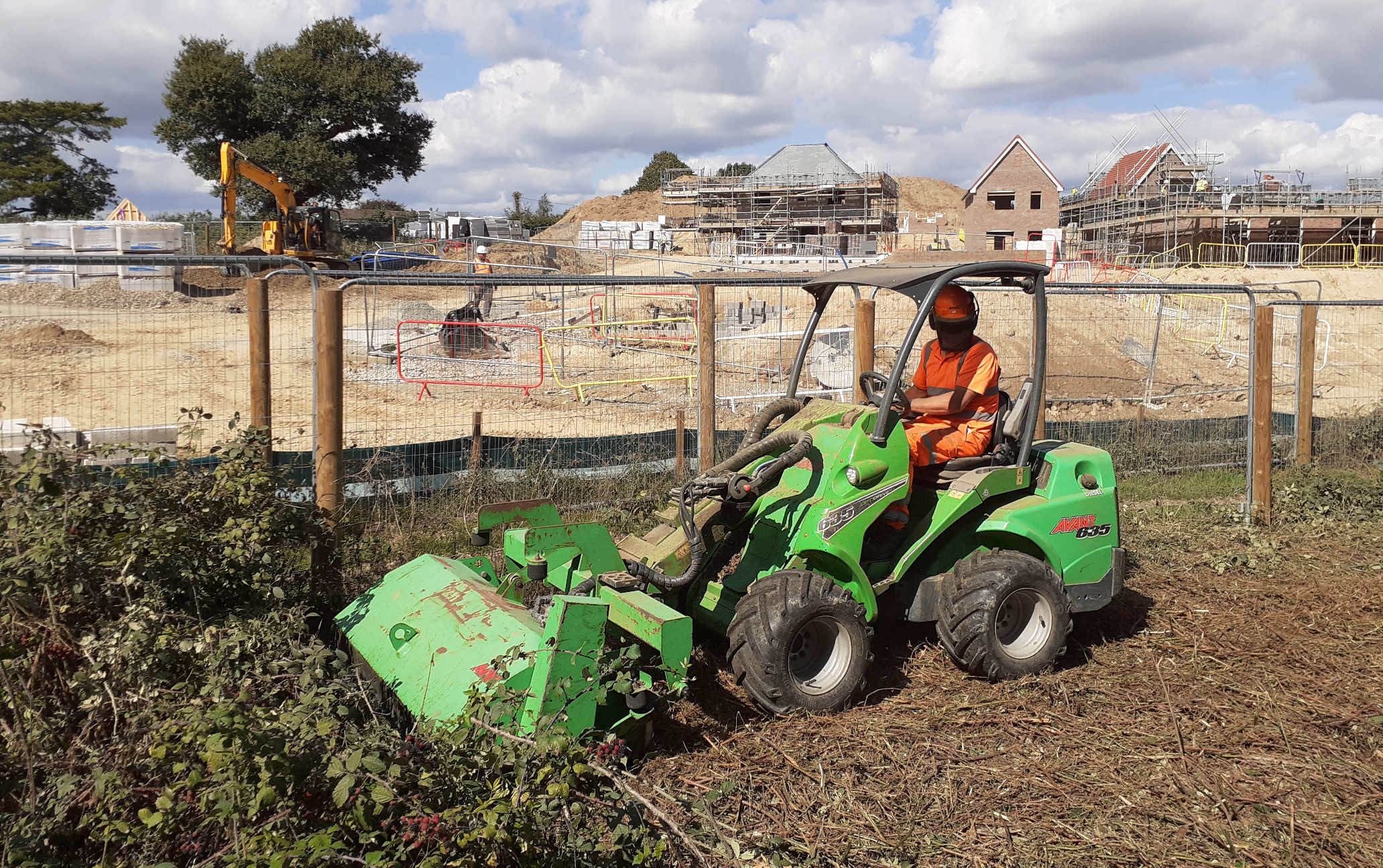 Is removing this hedgerow illegal? In the background are houses held to be a blot on the landscape, built by Charles Church and Persimmon in July and August of 2026. Copyright picture � Injustice (Countryside) Alliance. It is alleged that the site owners ploughed through more than 20 meters of long established hedges on the 1st of September 2026, in the process destroying valuable wildlife habitats, contrary to the Hedgerows Regulations 1997, and other Acts, designed to protect the natural world. The event, if it is or was an offence, was captured on camera, and video, by shocked security staff at Herstmonceux Museum. It is bad enough that the heritage view from 1896 has been obliterated. And all for what? These houses are not affordable. And why are they so tall?